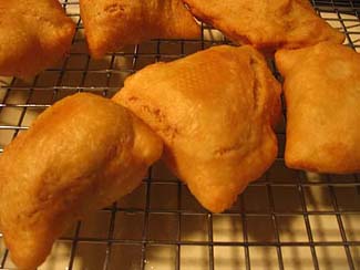 Draining samosas